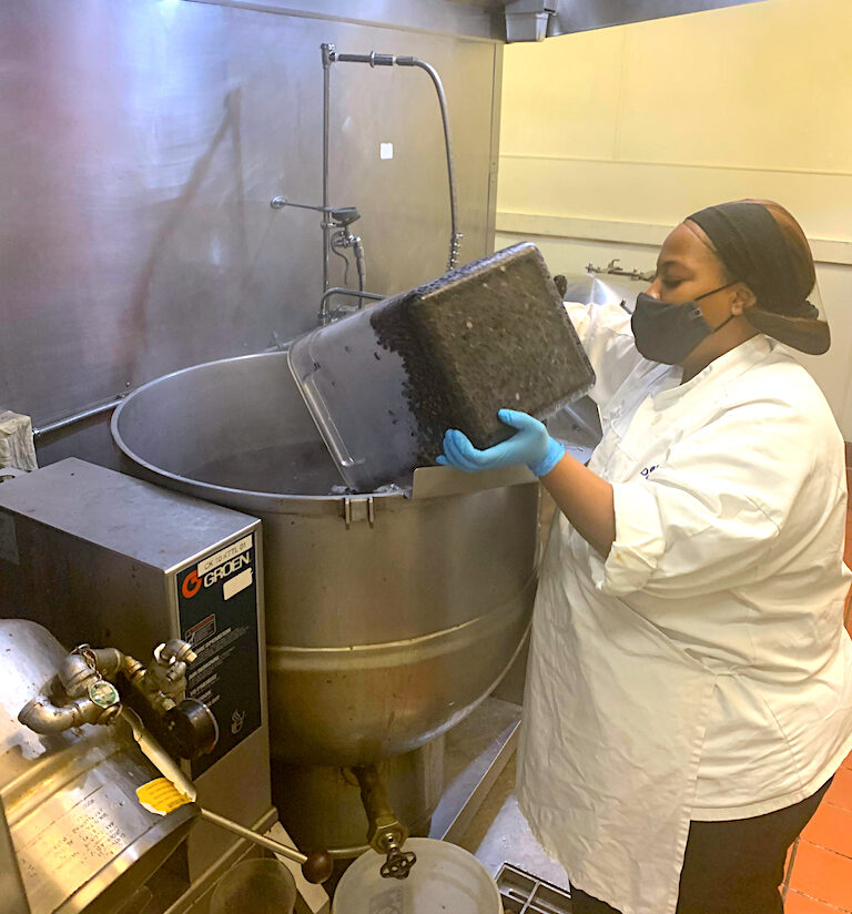 Chef Stephanie Stephens at Clark Kerr soaking beans overnight for easier preparation