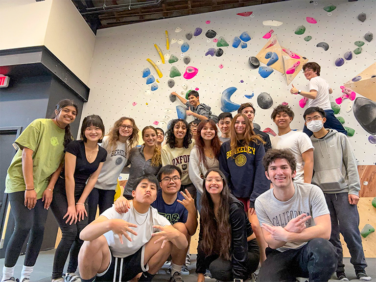 Devon Akiyama (upper right) and residents from Floors 4 and 5 of Unit 1 Deutsch at an RA-hosted bouldering event.