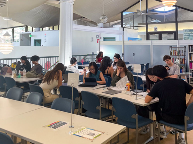 Students learn from peer tutors in the upstairs science section of the Student Learning Center. 