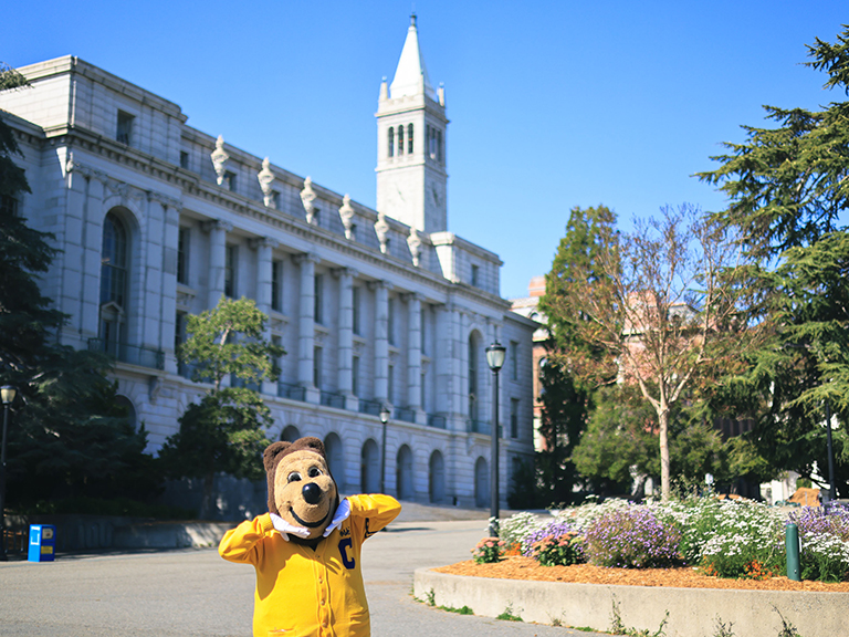 Oski standing in front of a building at UC Berkeley.
